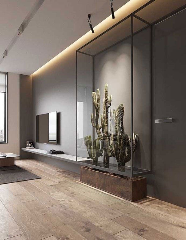 نمونهای از گل در قفسه شیشهای در پذیرایی